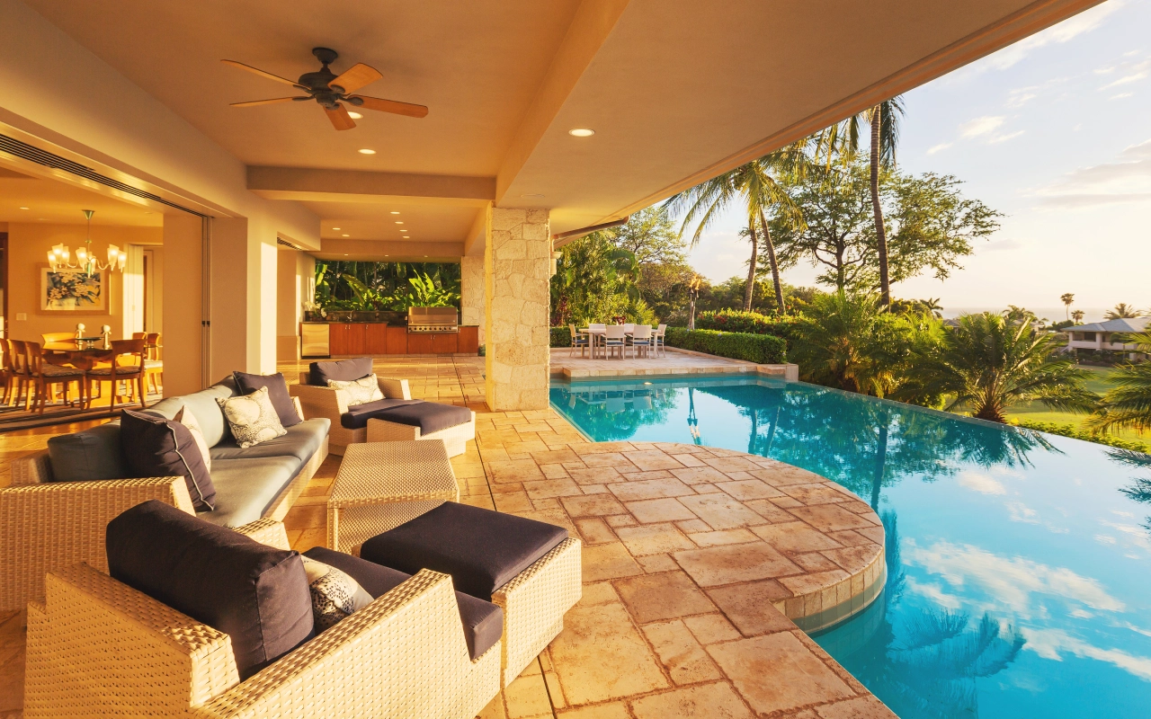 A pool with a lot of furniture in it